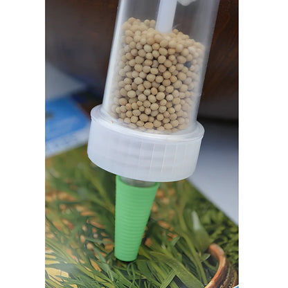12cm long plastic mini planter tool with 3cm diameter opening for seed distribution