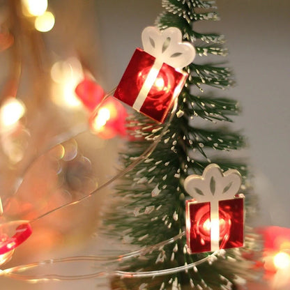 Copper wire LED Christmas decoration lights featuring festive designs like bells, trees, and elks