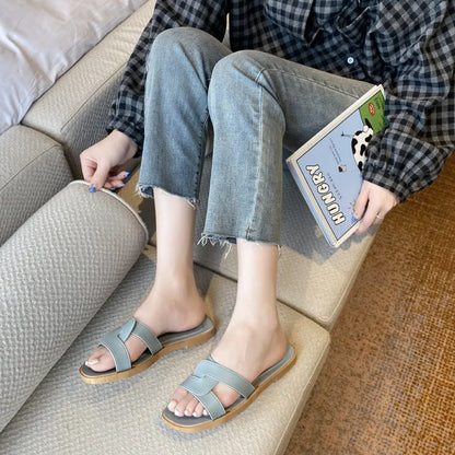 Women's PVC toe ring slippers with solid colour cross straps and non-slip sole