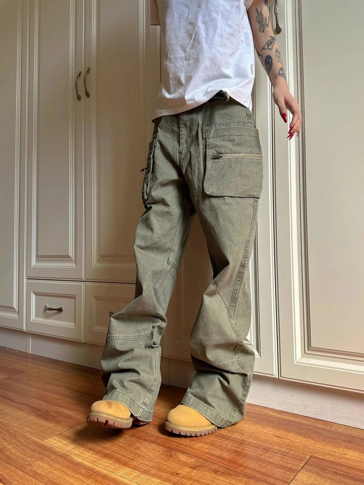 Green and black cotton work trousers with double zip and pockets