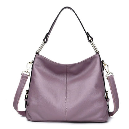 Black genuine leather vertical crossbody bag with multiple internal compartments and a sandwich pocket.