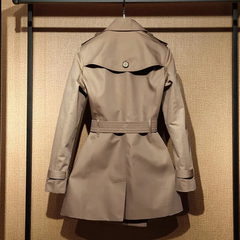 Women's Trench Coat British Style Double Breasted Front Shoulder Coat Women's Long Sleeve Windbreaker in Khaki with Button Details and Flight Sleeve Design in Polyester Fabric Available in Sizes S to 3XL
