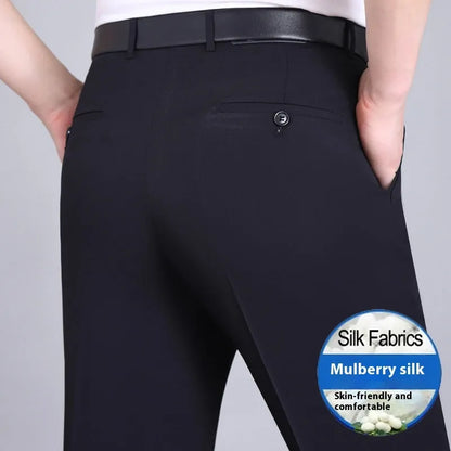 Man wearing dark blue straight-leg non-iron business trousers with a mulberry silk blend fabric.