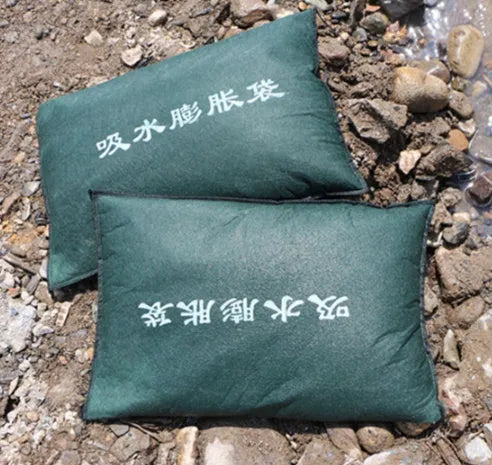 Water absorption expansion bag in canvas or non-woven fabric, sizes 30x70cm and 40x60cm, for flood control.