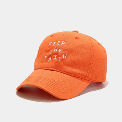 Men's cotton baseball cap with small embroidered letters on front in adjustable dome design