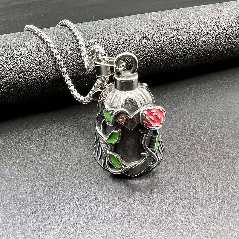 Polished titanium steel motorcycle bell with clear epoxy rose detail, shown from the side.