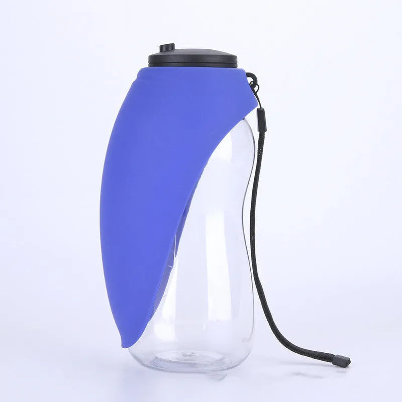 Blue portable pet water bottle with drinking bowl for dogs, showing 680ml capacity and hanging attachment