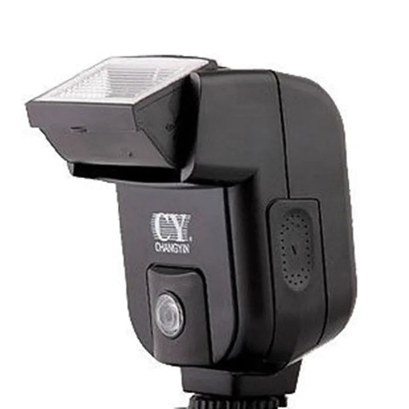 Compact black hot shoe camera flash with its head tilted upwards, showing the flash bulb and hot shoe mount.