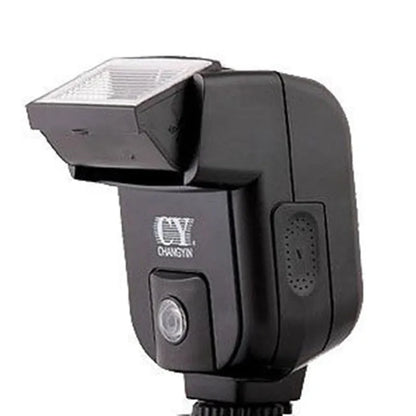 Compact black hot shoe camera flash with its head tilted upwards, showing the flash bulb and hot shoe mount.