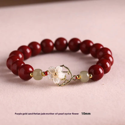 Handcrafted cinnabar bracelet with Hetian jade elements and lotus motifs in New Chinese style showing purple gold sand and emperor sandstone colour options