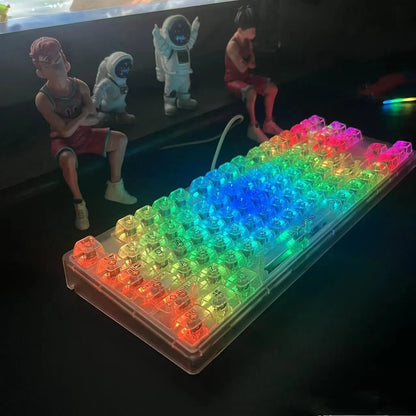 Full set of 132 transparent plastic keycaps for mechanical keyboard customisation on a white background.