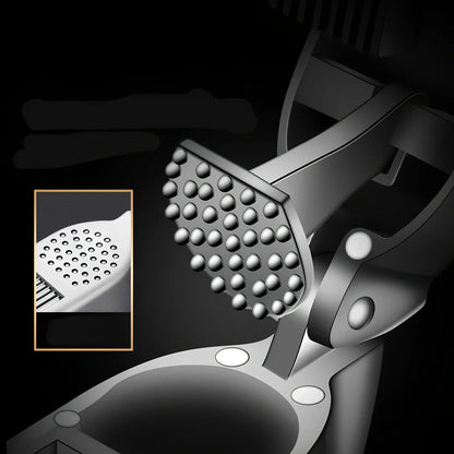 Silver aluminium garlic press with 20cm handle and integrated cleaning tool for unpeeled garlic crushing