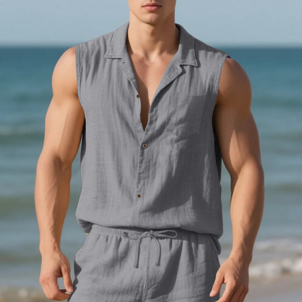 Man's sleeveless linen cardigan vest with a polo collar in a light khaki colour, laid flat.