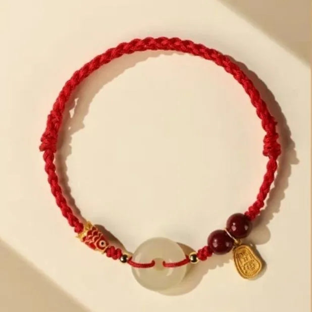 Hetian jade peace buckle bracelet with 10mm beads on red braided rope