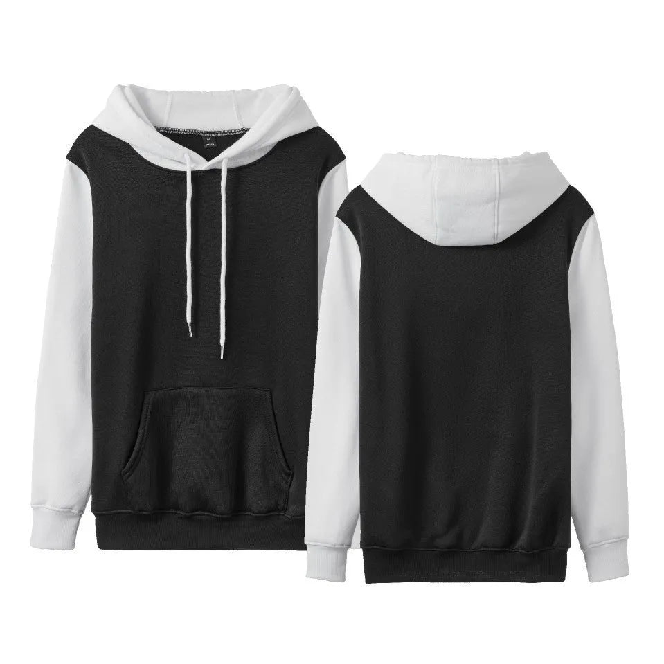 Man wearing a white loose fleece-lined hoodie with contrast stitching, showing the pullover style and hood.