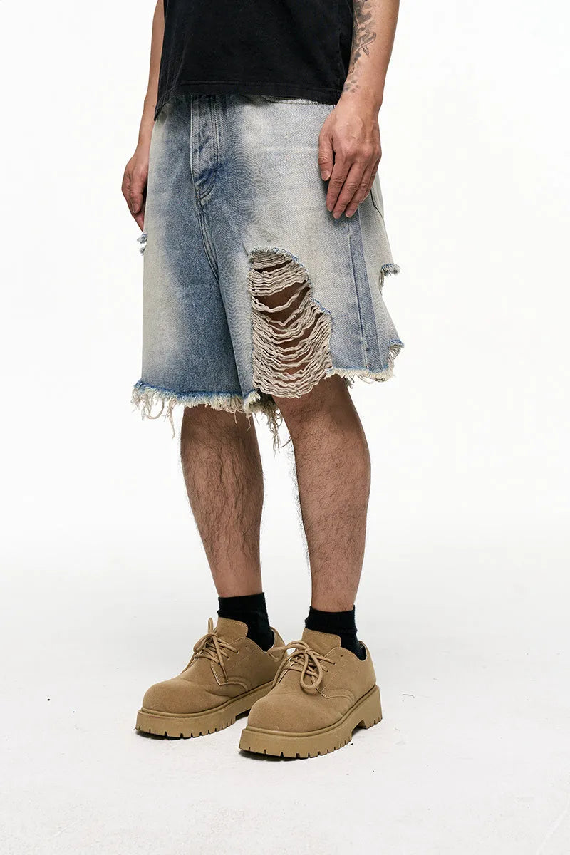 Men's light blue baggy denim shorts with retro washed finish and wide leg cut