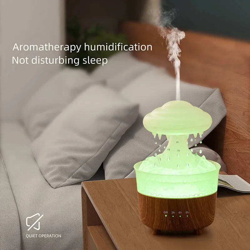 Wood grain rain cloud humidifier with LED lights and water drip feature on a table
