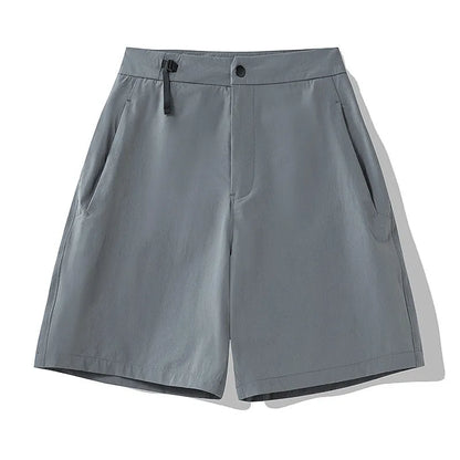Men's khaki sports shorts with quick-drying fabric and elastic waist for running and climbing activities