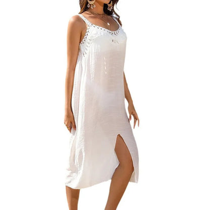 White suspender beach dress with hollow crocheted weave and bottom slit, suitable for swimming and beach activities