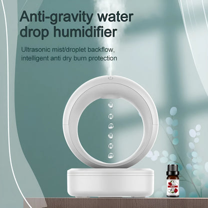 White round anti-gravity desk humidifier showing levitating water droplet effect with USB connection