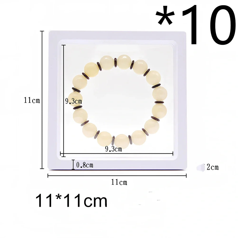 Black 11x11cm suspended 3D floating display frame holding a coin, with square base for stable collectible showcase