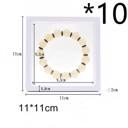 Black 11x11cm suspended 3D floating display frame holding a coin, with square base for stable collectible showcase