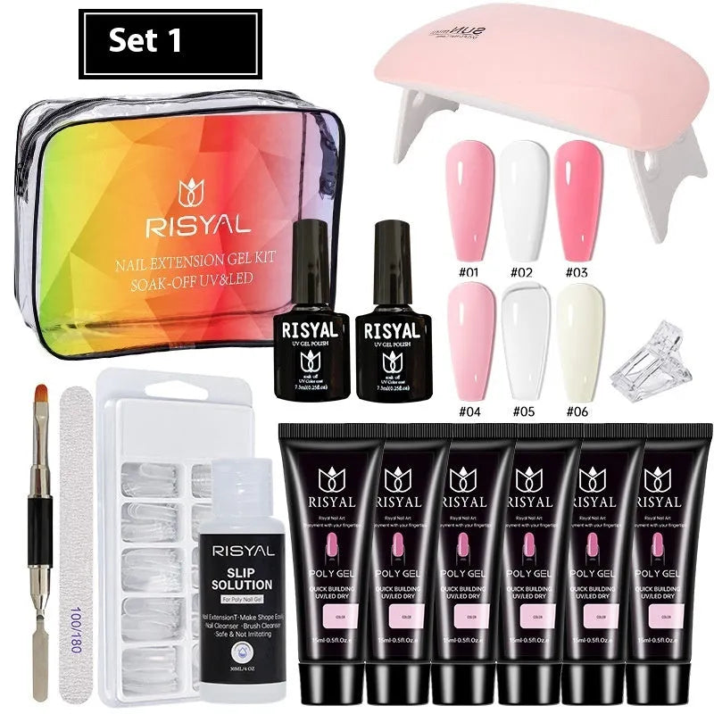 UV nail extension kit with polishes, mini lamp, glues, and metal tools in a zipper bag