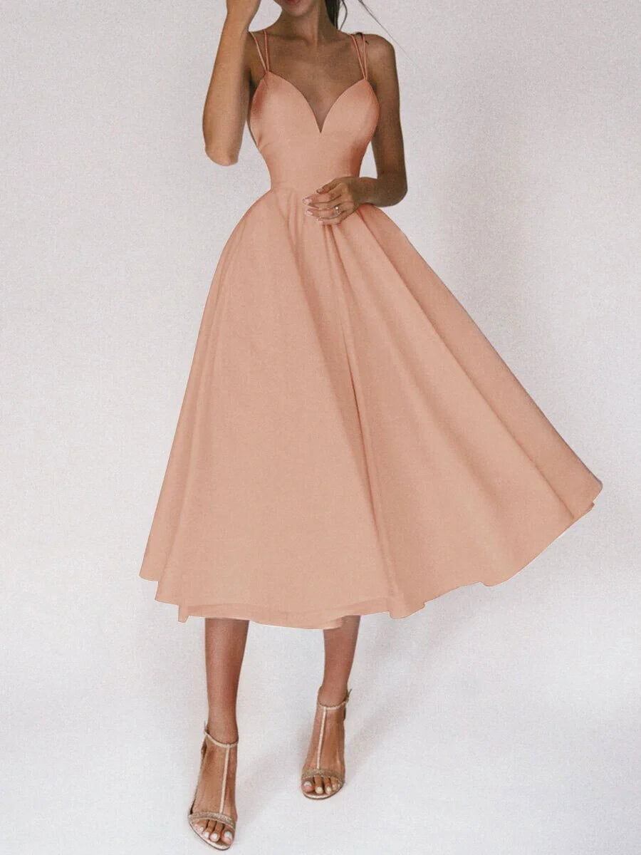 Elegant V-neck dress with adjustable straps, available in a range of vibrant colours for stylish summer wear