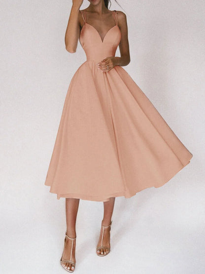 Elegant V-neck dress with adjustable straps, available in a range of vibrant colours for stylish summer wear