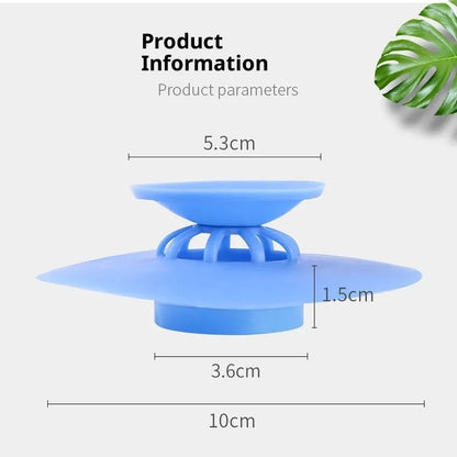 UFO-style silicone press sink drain cover in white, pink, gray, blue, and green