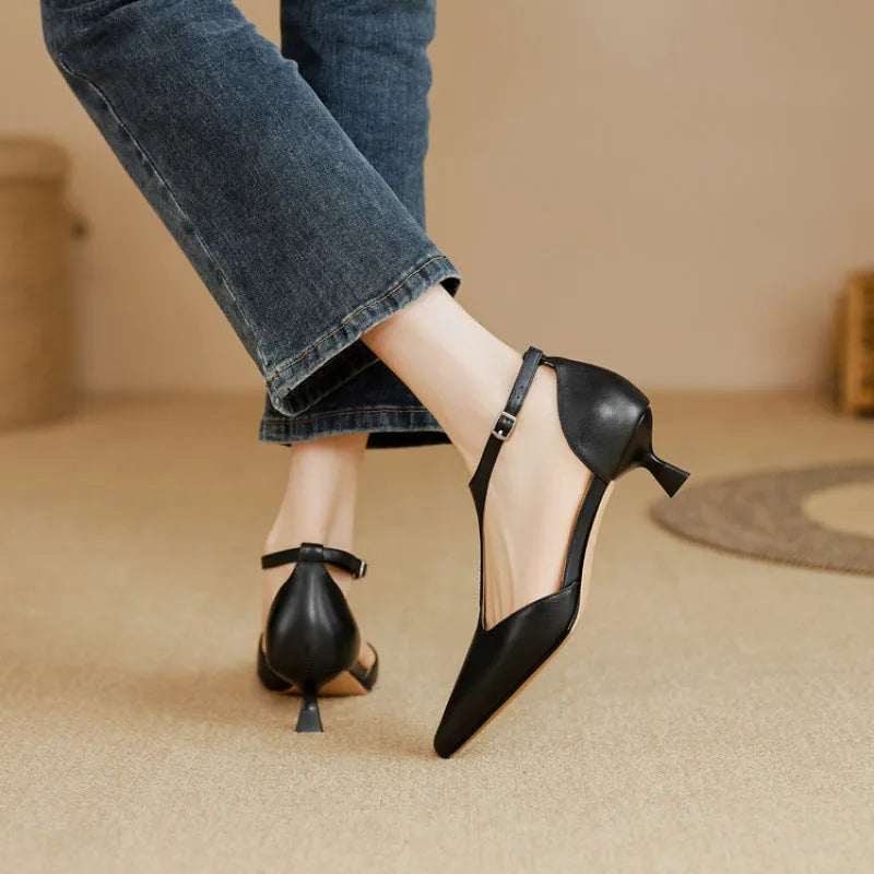 Women's high heels in black or brown cowhide leather with pointed toe design, available in sizes 34-39 for evening wear and formal occasions