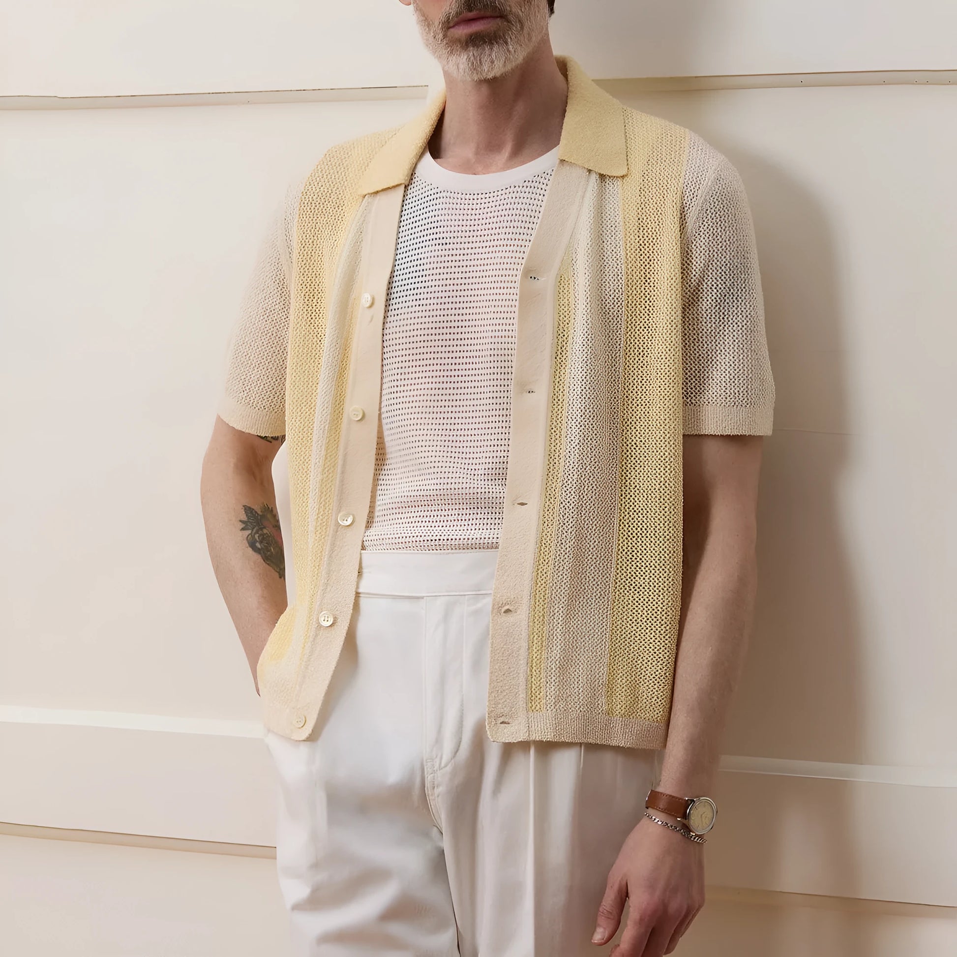 Yellow men's casual polo shirt with a hollow-out asymmetric design on the front.
