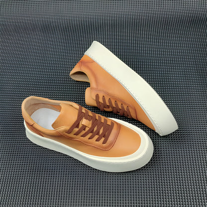 Men's white genuine cowhide board shoes with a thick rubber platform sole and round toe.