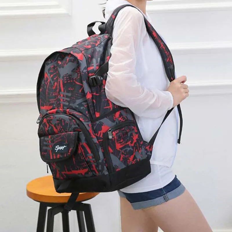 Blue nylon backpack showing front organisational pockets, side water bottle holder, and adjustable shoulder straps