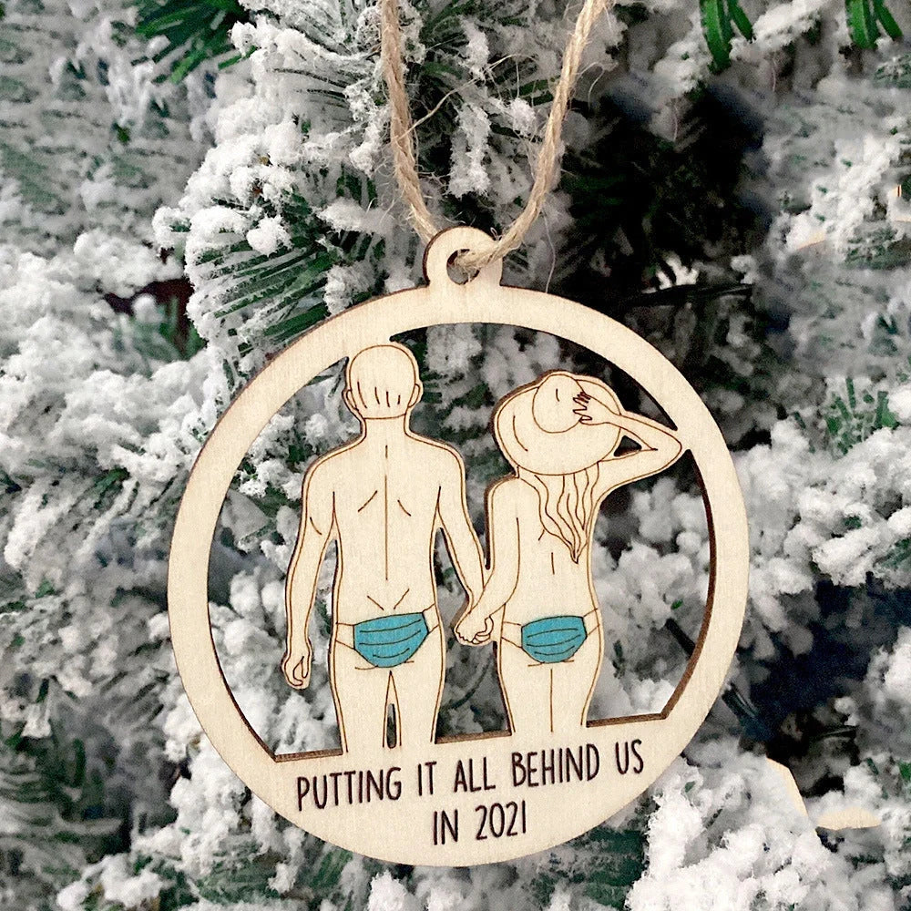Laser-cut wooden Christmas tree pendant with lovers, snowman, and deer designs