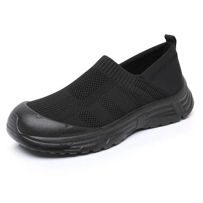 Women's black one pedal slip-on shoes with breathable cloth upper and PVC sole