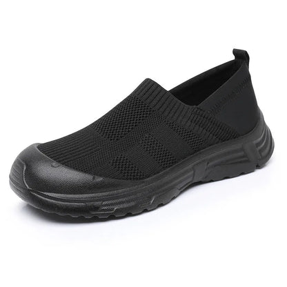 Women's black one pedal slip-on shoes with breathable cloth upper and PVC sole