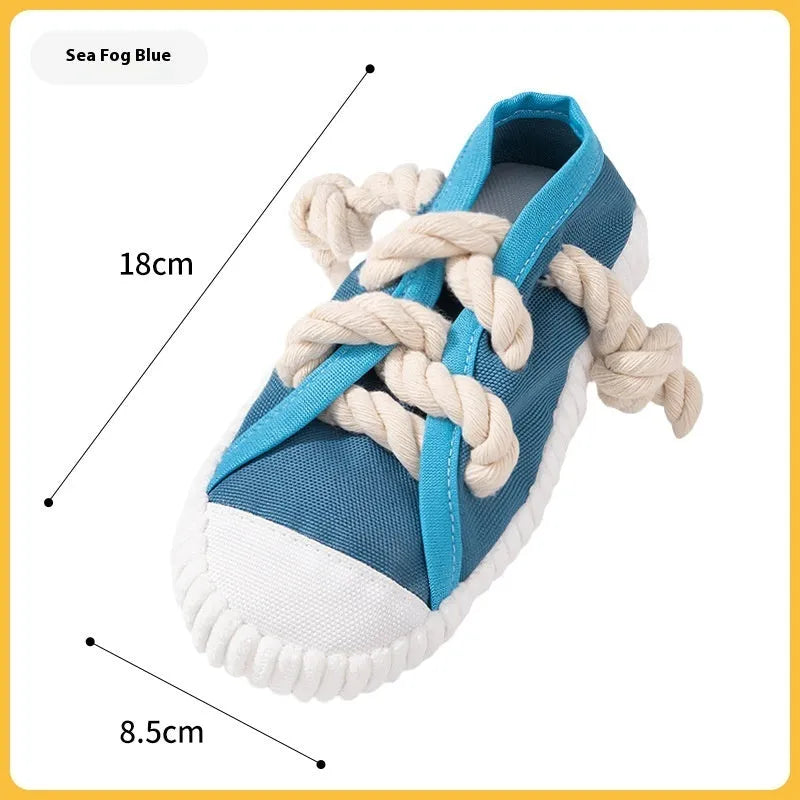 Plastic squeaky dog slipper chew toy in yellow, black, or blue colour