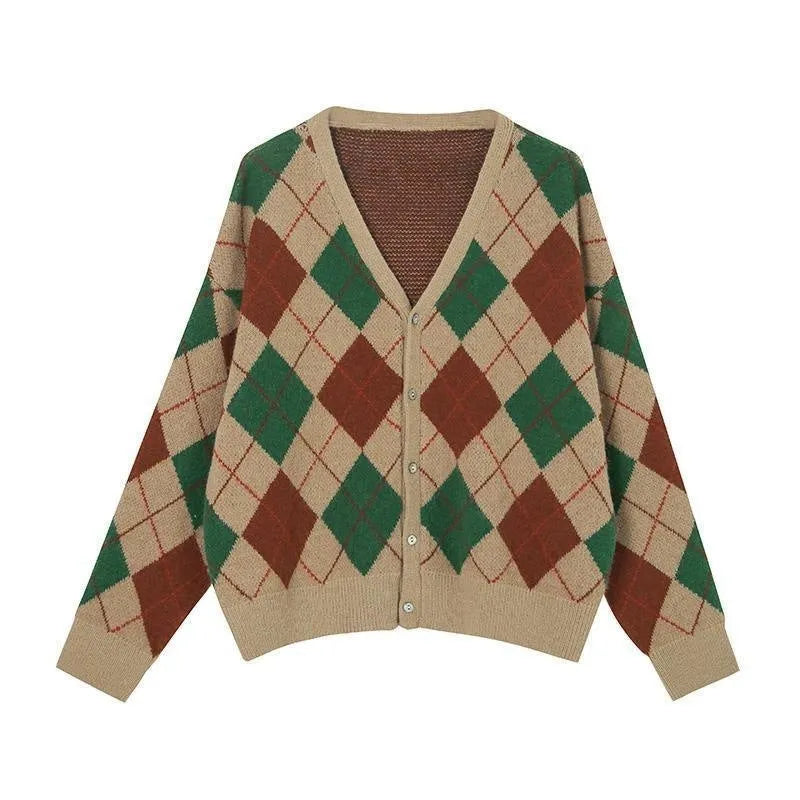 Long sleeve knitted cardigan in a light khaki colour, shown open over a white top, demonstrating its relaxed fit and medium weight.
