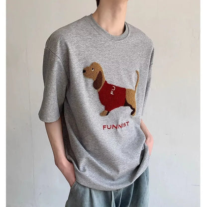 Men's black cotton T-shirt with embroidered sausage dog wrapped in a towel design