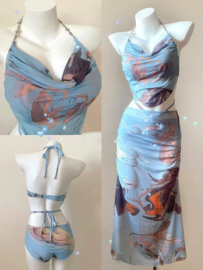 Women's blue printed triangle bikini set with skirt, showing steel support push-up top.