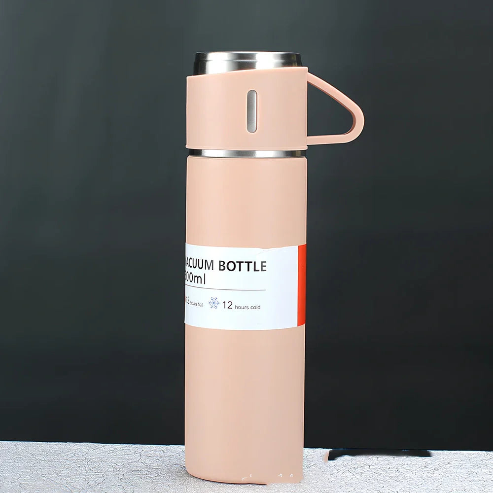 Pink stainless steel vacuum water cup with straight design showing 500ml capacity and gift box packaging
