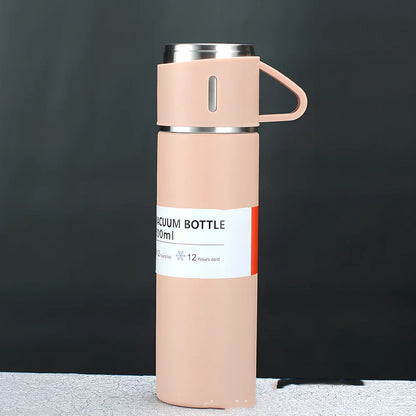 Pink stainless steel vacuum water cup with straight design showing 500ml capacity and gift box packaging