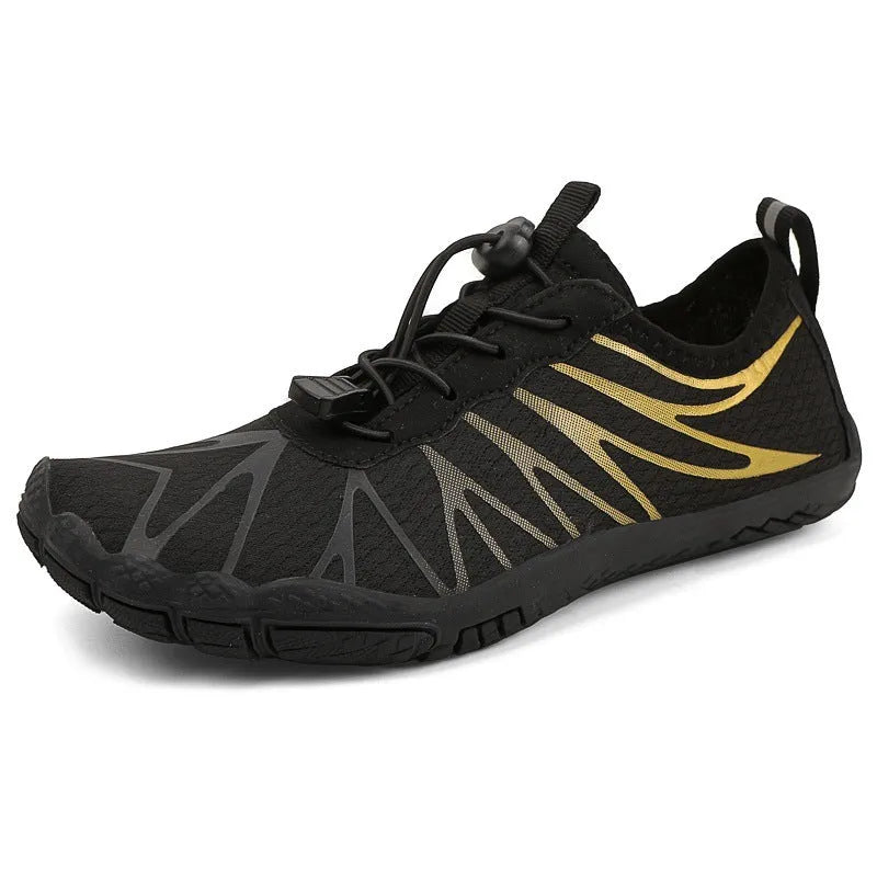 Men's and women's low-top breathable sports running shoes with a natural rubber sole on a hard ground surface.
