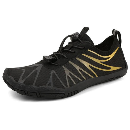 Men's and women's low-top breathable sports running shoes with a natural rubber sole on a hard ground surface.