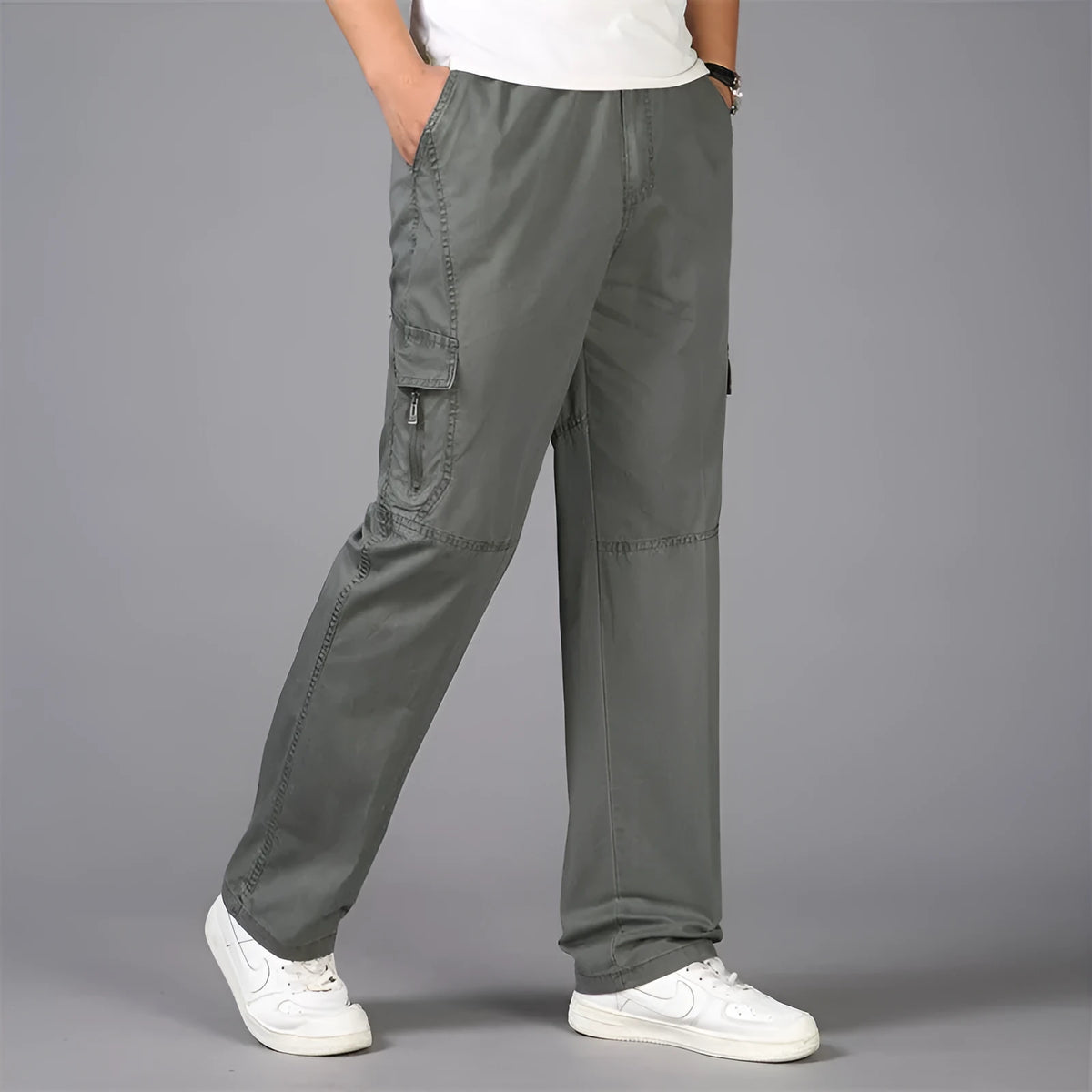 Loose straight leg cotton cargo trousers with multi-pocket, mid waist, zip placket, in black, army green, khaki, or natural yellow.