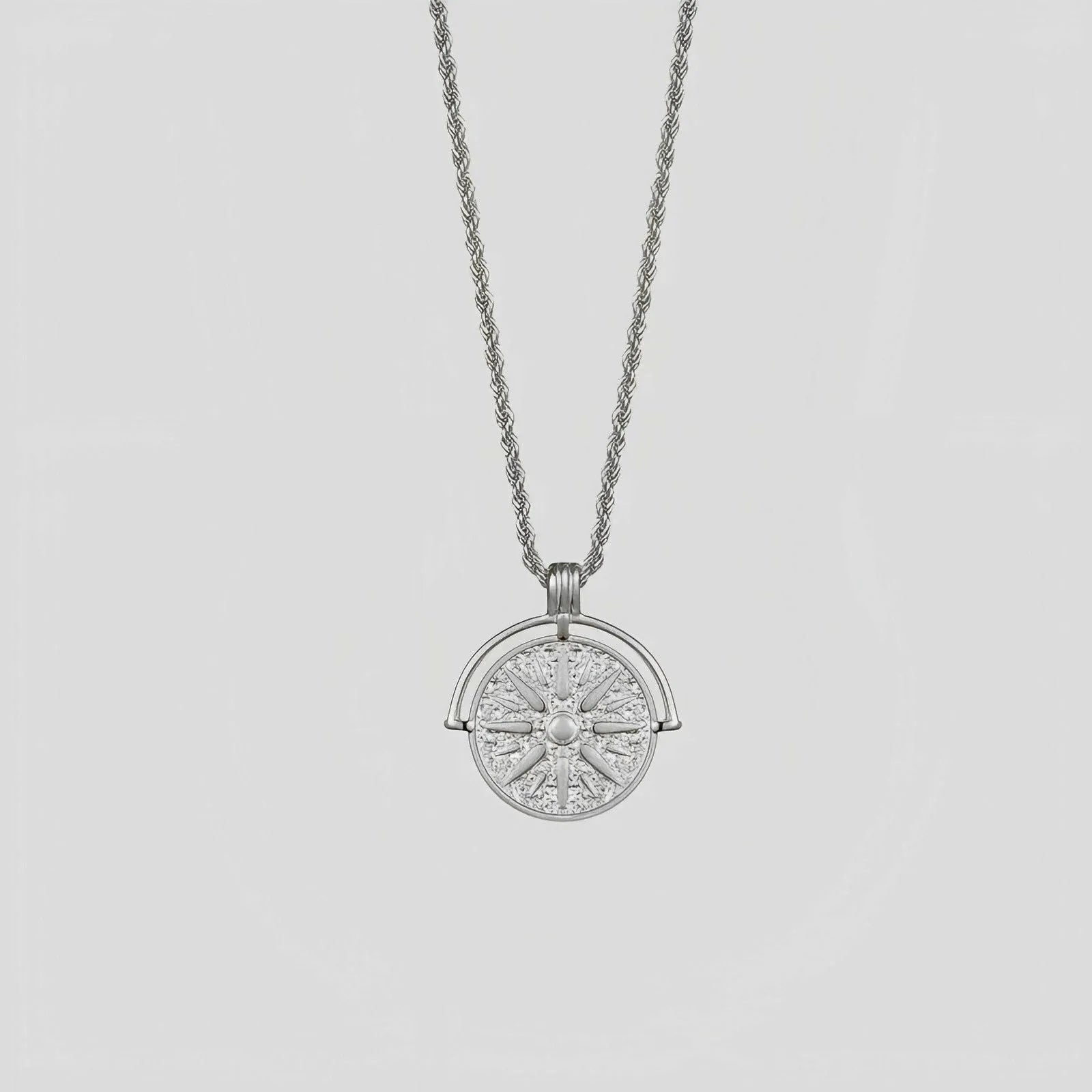 Stainless steel sunflower pendant necklace with geometric embossed design on adjustable chain