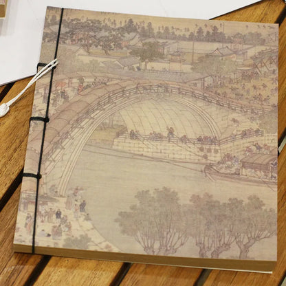A5 antique wire-bound notebook with classical artwork cover, black oil wax rope binding, and decorative tassels