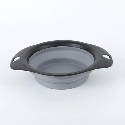Green silicone pet bowl shown in its full size and collapsed flat for storage.