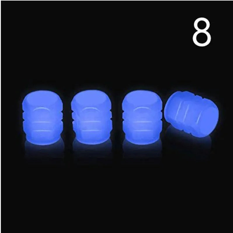Glow-in-the-dark rubber tyre valve caps in five colour options on tyre valve stem